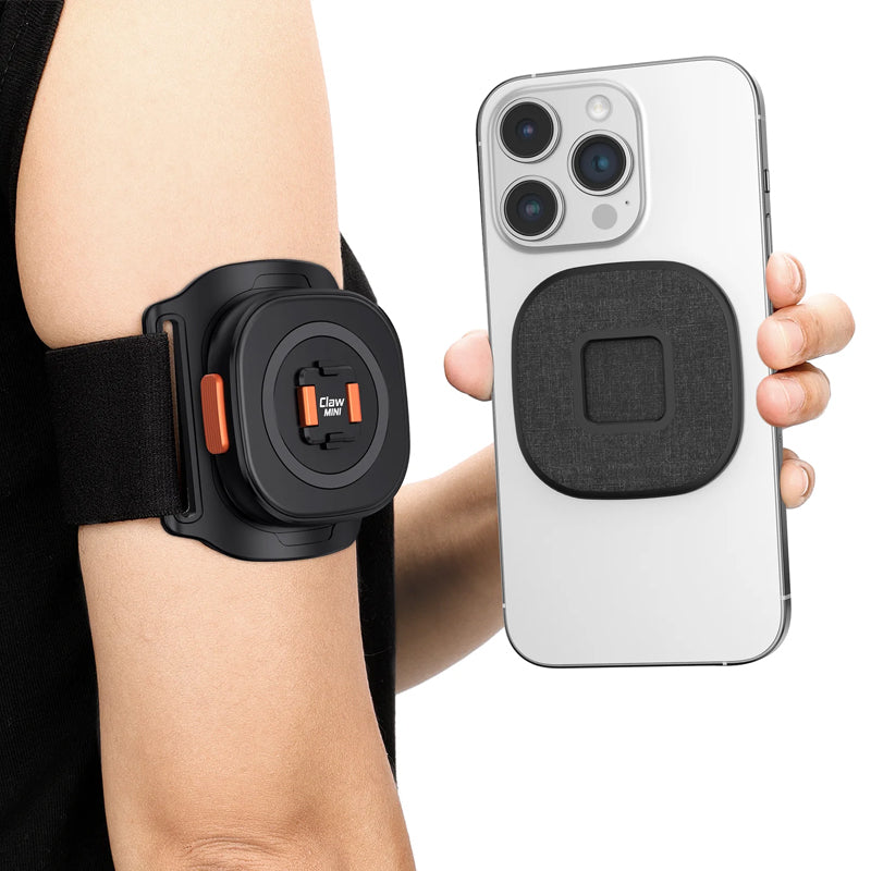 Holding a phone with an arm wearing the strap